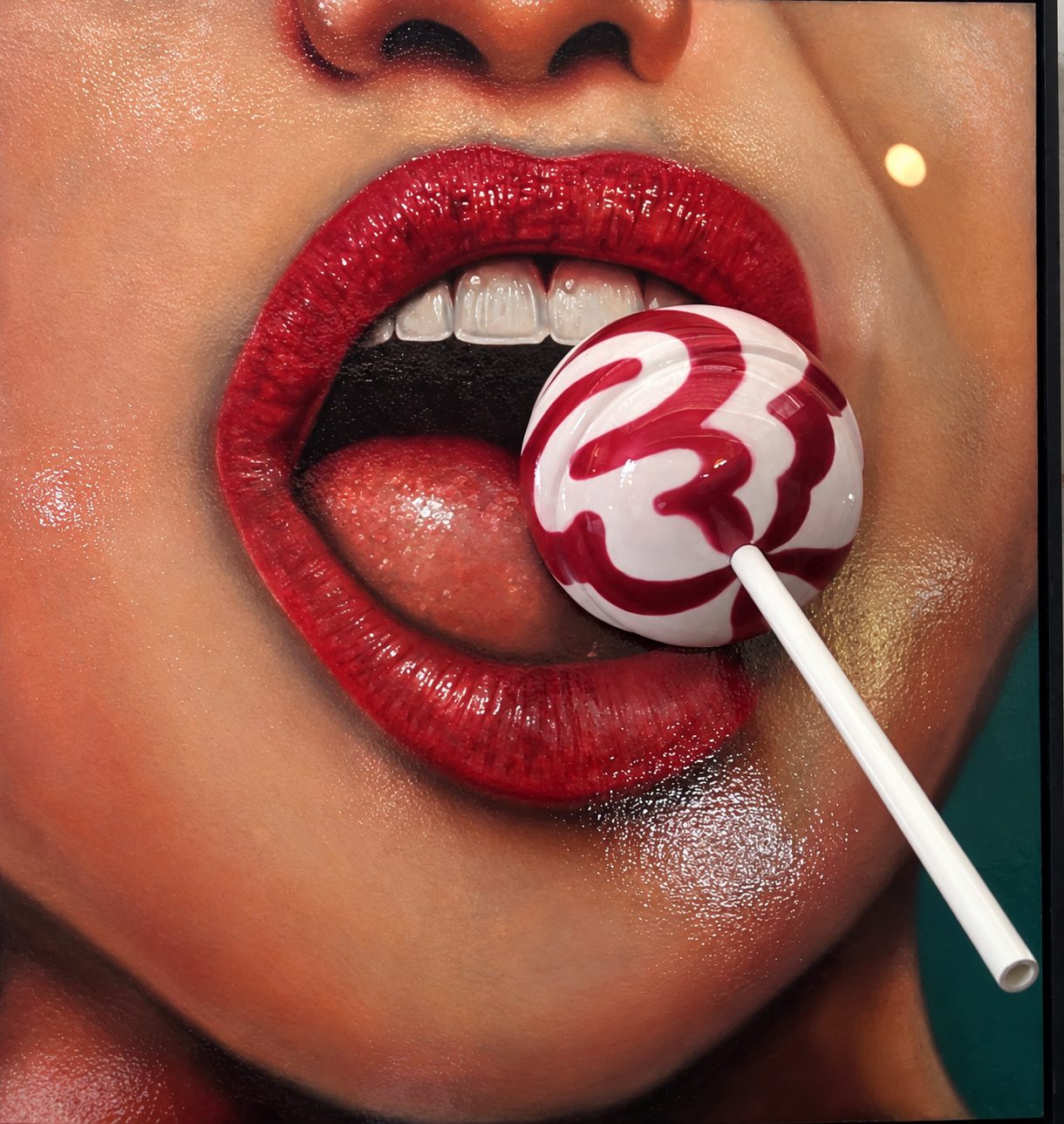 Glossy red lips and swirled lollipop artwork